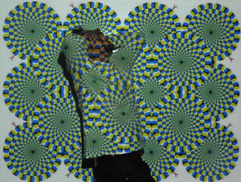 目の錯覚で円がまわる画像を破いたらもっと錯覚